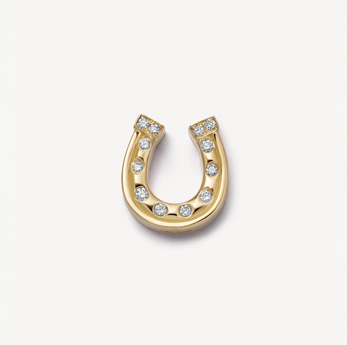 lucky-horseshoe-charm-solid-18k-gold_a847bf68-ad24-4304-af4f-d6ea86f4c4d7.png